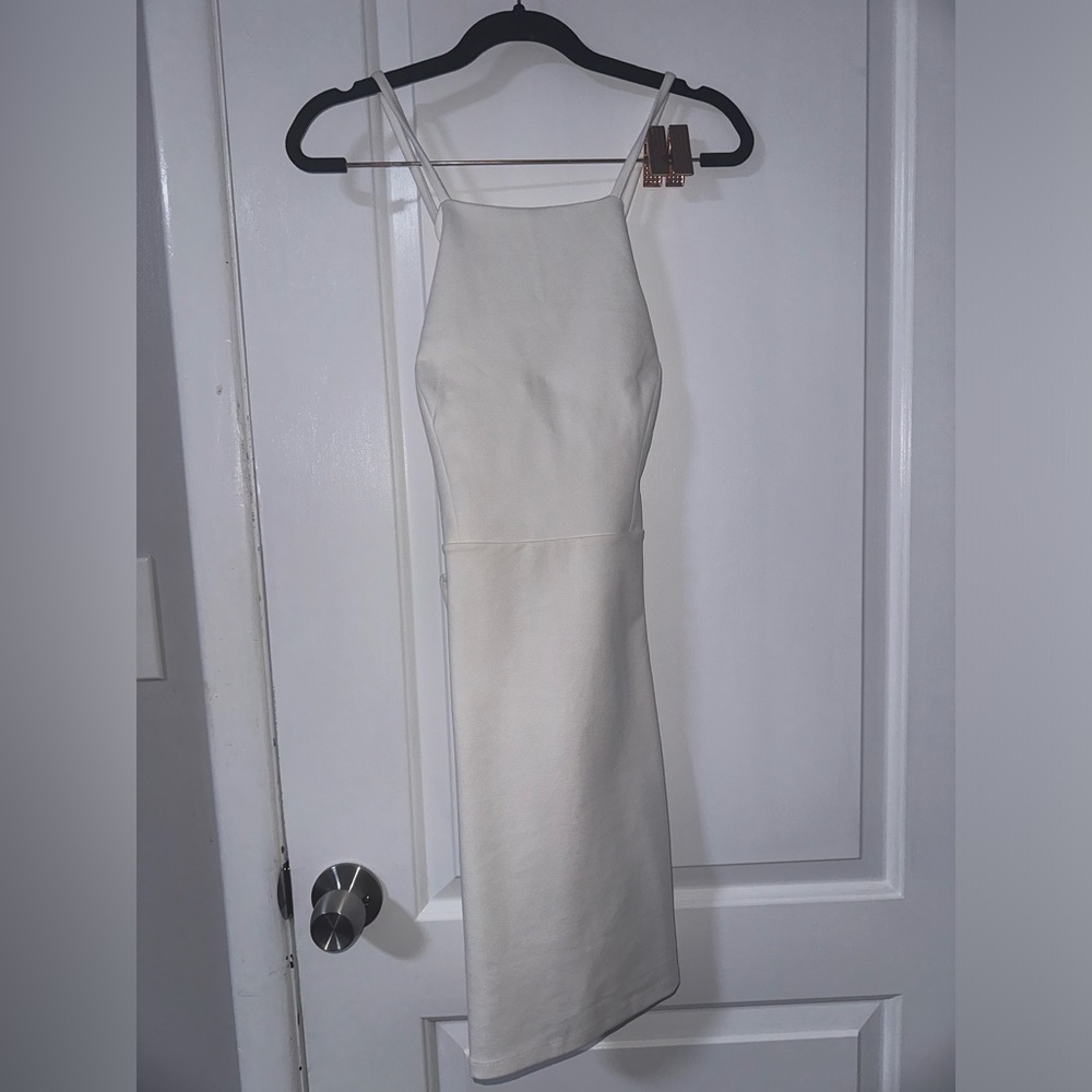 Brand new with tag, white, open back size small